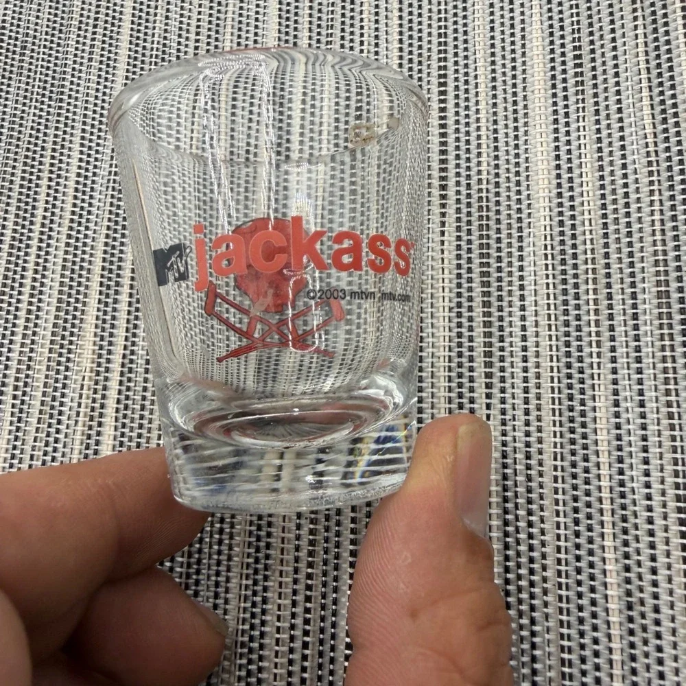Vintage 2003 MTV Jackass Shot Glass Red Skull Cross Crutches Logo Clear Barware